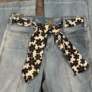NWOT Altar’d State Flare Jeans never worn. Removable scarf belt. Smoke free home